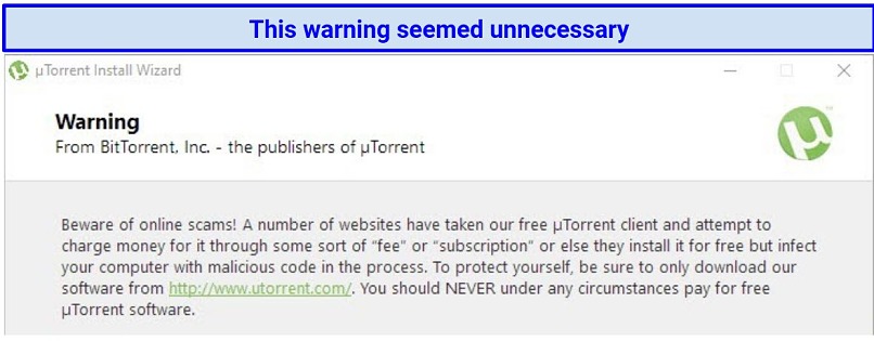 Screenshot of a warning from uTorrent about scammers selling the free version of the program